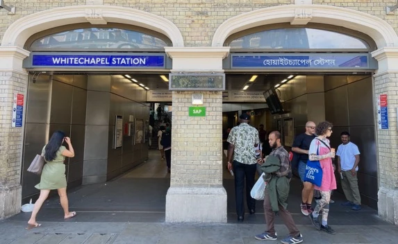 Whitechapel Station entrance with English and Bangla signs
