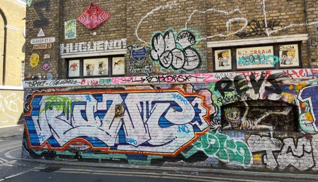 Graffiti wall by unknown Brick Lane artists