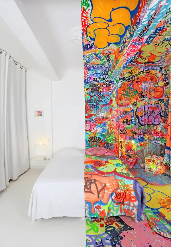 French Artist Covers Half of a Hotel Room in Graffiti
