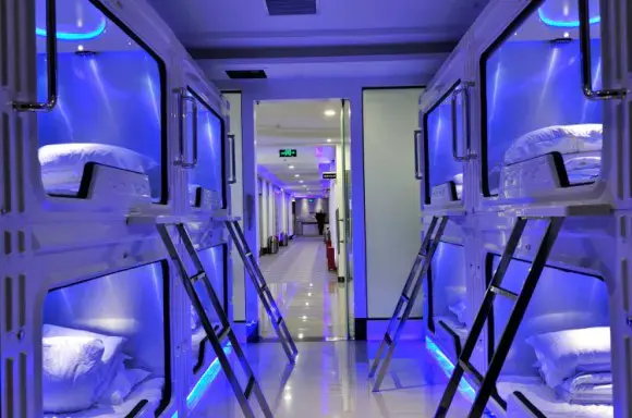 A Futuristic Capsule Hotel Where Robots Serve Their Human Overlords