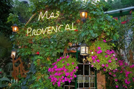 In France, A Restaurant That Is Covered Entirely In Flowers 2